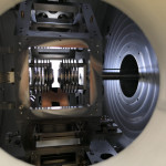 Projet MORA (Matter’s Origin from the RadioActivity of trapped and laser oriented ions). Chambre à vide développée au LPC Caen. Piège à ions avec support octogonal soutenant les détecteurs. Projet MORA