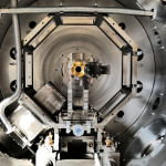 Projet MORA (Matter’s Origin from the RadioActivity of trapped and laser oriented ions). Chambre à vide développée au LPC Caen. Support octogonal avec un détecteur en place pour la détection des particules beta. Projet MORA
